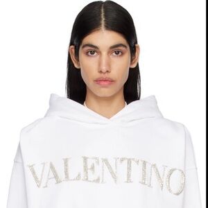 Cotton fleece hoodie. · Crystal-cut logo appliqués at front · Drawstring cropped